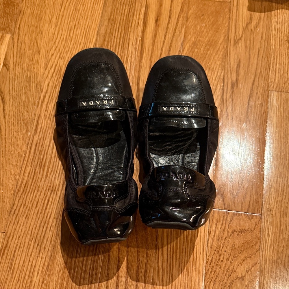 Prada women’s Shiny Black Leather Loafers